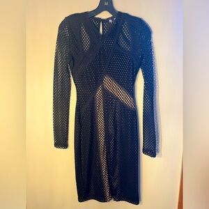 Michael Kors size XS black straight dress with cutouts and lining .